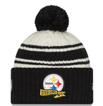 Men's New Era Cream/Black Pittsburgh Steelers 2022 Sideline Sport Cuffed Pom Knit Hat