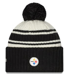 Men's New Era Cream/Black Pittsburgh Steelers 2022 Sideline Sport Cuffed Pom Knit Hat