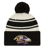 New Era Cream/Black Baltimore Ravens 2022 Sideline Sport Cuffed Pom Knit Hat